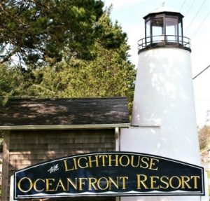 lighthouse oceanfront resort sign