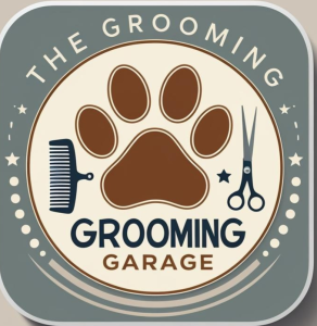 The logo for The Grooming Garage, featuring a large brown paw print in the center with a comb on the left and scissors on the right, surrounded by the business name.